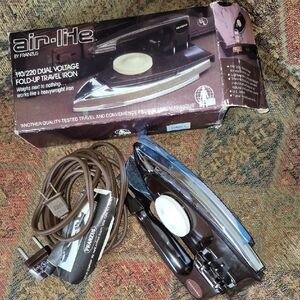 Dual voltage fold up travel iron
